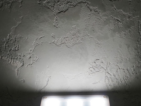 gray wall texture of antique decorative plasterの写真素材