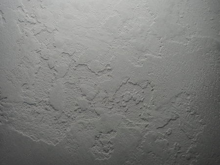 gray wall texture of antique decorative plasterの写真素材