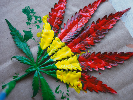 Cannabis leaves on craft paper. colorful background.の写真素材