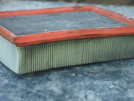 Air filter on old metal background, close-up, selective focusの写真素材