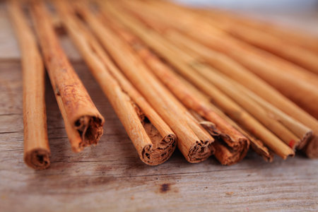 Ceylon cinnamon sticks on a wooden tableの写真素材