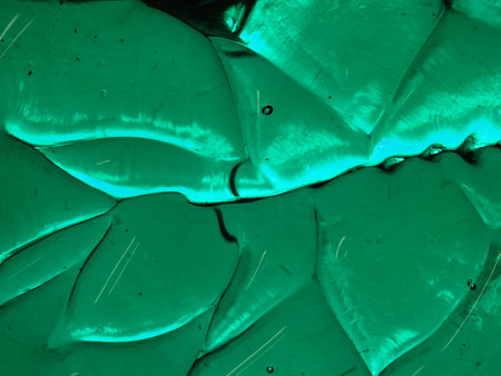 abstract background from a piece of glass in green and blue tint
