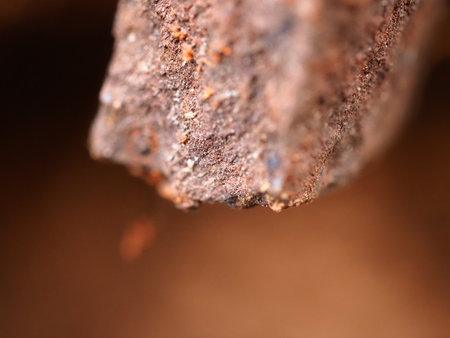 rusty, sharp-edged fragment of an old mine shellの写真素材