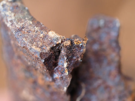 rusty, sharp-edged fragment of an old mine shell