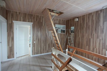 interior of a new house, wooden staircase and the door.の写真素材