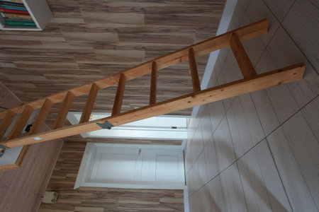 Wooden stairs in the interior of a modern house, close-upの写真素材