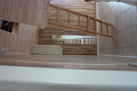 interior of a modern house, wooden staircase and wooden walls.の写真素材