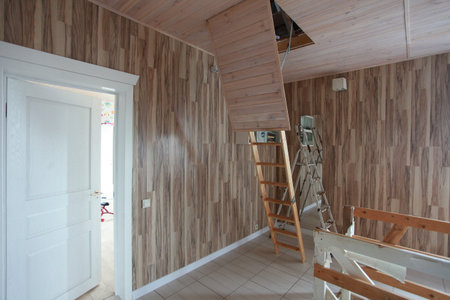 Interior of a new house with wooden walls and floor. Nobody insideの写真素材
