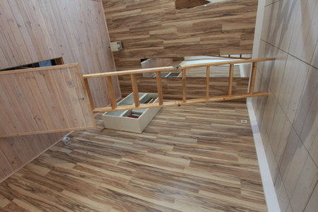 Interior of a modern house, wooden stairs, parquet floorの写真素材