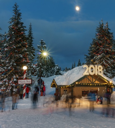 North Vancouver Canada - December 30, 2017: Ice skating rink, fun and entertainment at Grouse Mountain.のeditorial素材