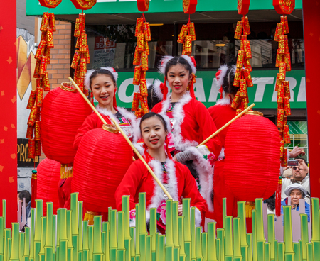 VANCOUVER, CANADA - February 2, 2014: People marching at Chinese New Year parade in Vancouver Chinatownのeditorial素材