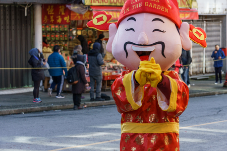 VANCOUVER, CANADA - February 18, 2018: God of Wealth in Vancouver Chinatown during the Chinese New Year celebration.のeditorial素材