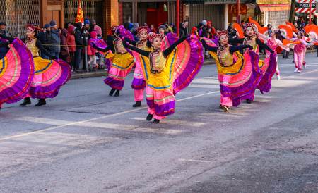 VANCOUVER, CANADA - February 18, 2018: People dancing at Chinese New Year parade in Vancouver Chinatownのeditorial素材