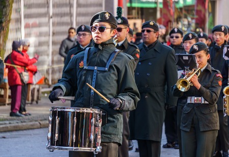 VANCOUVER, CANADA - February 18, 2018: Marching Band performing during Chinese New Year parade in...