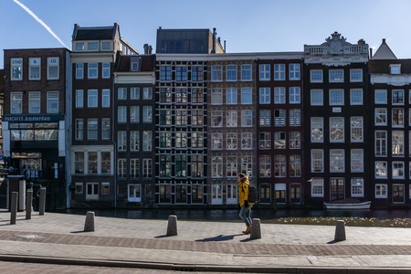 AMSTERDAM, NETHERLANDS - March 20, 2018 : View on the narrow houses of Amsterdamのeditorial素材