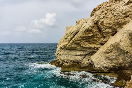 rocky coast of Mediterranean sea north of Israelの写真素材