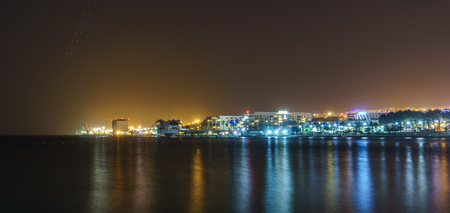 EILAT, ISRAEL - March 28, 2018: City at night view from the beachのeditorial素材