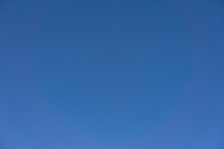 Plain blue color sky backgroundの写真素材