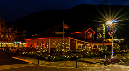 Harrison Hot Springs, CANADA - December 21, 2018: luxury decorated homes and streets with garland lights in Canadaのeditorial素材