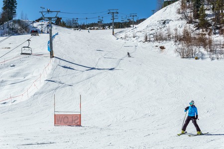 KIMBERLEY, CANADA - MARCH 19, 2019: ski track at alpine resort at sunny spring dayのeditorial素材