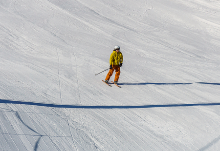 KIMBERLEY, CANADA - MARCH 22, 2019: Mountain Resort view early spring people skiingのeditorial素材