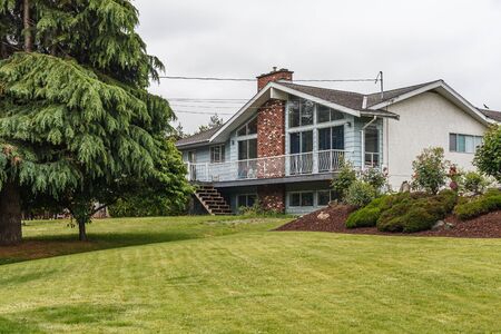 ABBOTSFORD, CANADA - MAY 29, 2019: street view of small town residential housing in spring timeのeditorial素材