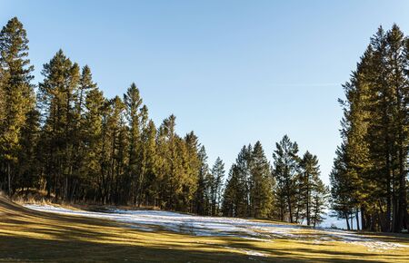 Golf Course field in small town in rocky mountains sunny afternoonの写真素材