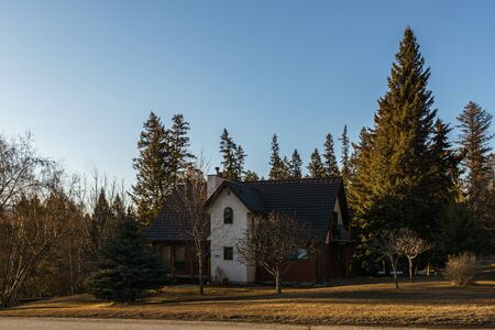FAIRMONT HOT SPRINGS, CANADA - MARCH 22, 2019: street view of small town residential housing in spring timeのeditorial素材