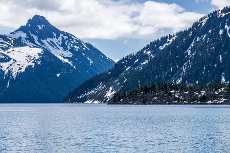 view at Garibaldi lake beautiful sunny morning with clouds on bluew skyの写真素材
