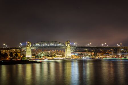 VANCOUVER, CANADA - JULY 31, 2019: view to Burrard bridge at night from Sunset Beach in downtown.のeditorial素材