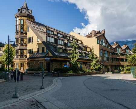 WHISTLER, CANADA - AUGUST 25, 2019: urban environment and street view with people sunny summer day