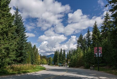 WHISTLER, CANADA - AUGUST 25, 2019: urban environment and street view with people sunny summer dayのeditorial素材