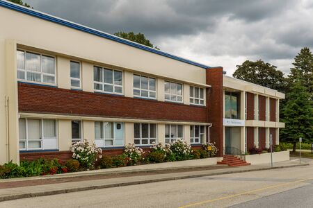NEW WESTMINSTER, CANADA - JUNE 7, 2019: Building and infrastructure of the Kruger Products manufacture.のeditorial素材