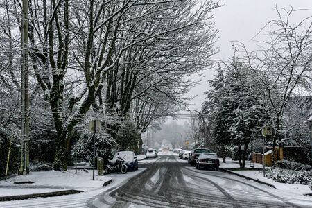 VANCOUVER, CANADA - FEBRUARY 4, 2020: residential area during snowfall winter time.のeditorial素材