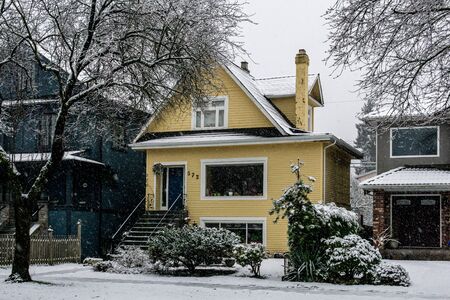VANCOUVER, CANADA - FEBRUARY 4, 2020: residential area during snowfall winter time.のeditorial素材