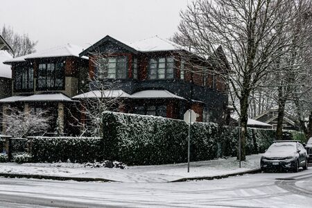 VANCOUVER, CANADA - FEBRUARY 4, 2020: residential area during snowfall winter time.のeditorial素材