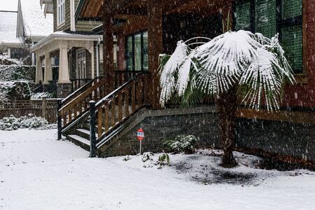 VANCOUVER, CANADA - FEBRUARY 4, 2020: residential area during snowfall winter time.のeditorial素材