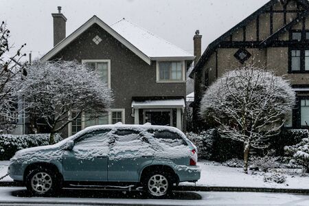 VANCOUVER, CANADA - FEBRUARY 4, 2020: residential area during snowfall winter time.のeditorial素材