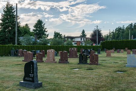 BURNABY, CANADA - JUNE 12, 2019: landscape view in Ocean View Cemetery with colorful trees in summer day.のeditorial素材