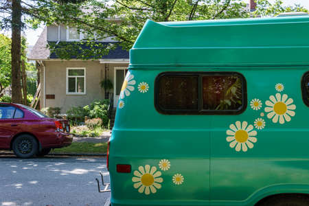VANCOUVER, CANADA - JUNE 13, 2019: city street view overcast sky and treesのeditorial素材
