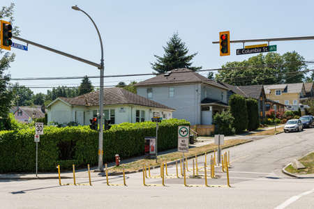 NEW WESTMINSTER, CANADA - JUNE 26, 2019: street view of quiet neighborhood alberta street no through...