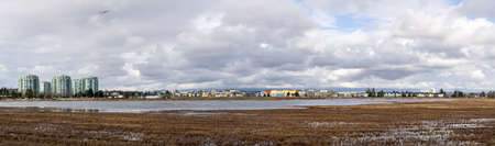 RICHMOND, CANADA - FEBRUARY 2, 2020: Open space panorama with cloudy sky in the center of the cityのeditorial素材