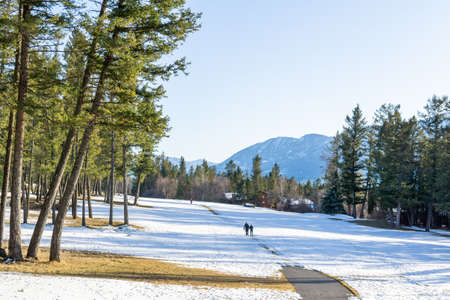 FAIRMONT HOT SPRINGS, CANADA - MARCH 16, 2020: big field in snow on sunny spring dayのeditorial素材