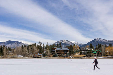 INVERMERE, CANADA - MARCH 17, 2020: frozen Windermere lake and rocky mountains in british columbia canadaのeditorial素材