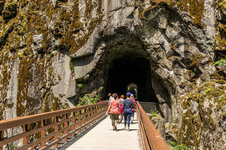 OTHELLO TUNNELS, CANADA - JULY 1, 2019: people on the bridge at popular tourist destination