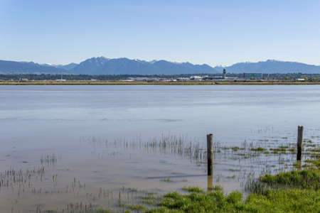 RICHMOND, CANADA - May 10, 2020: - YVR Vancouver International Airport view cross Fraser river.のeditorial素材
