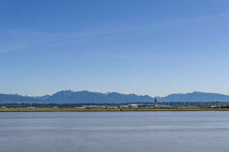 RICHMOND, CANADA - May 10, 2020: - YVR Vancouver International Airport view cross Fraser river.のeditorial素材