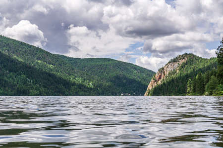 Paul Lake Summer time with green mountains and white clouds british columbia canadaの写真素材