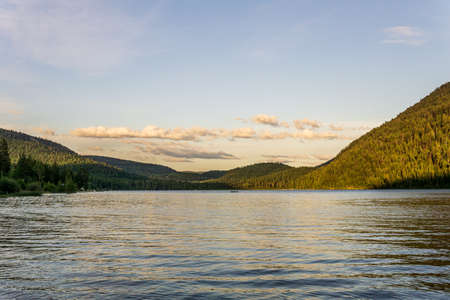 Paul Lake Summer time with green mountains and white clouds british columbia canadaの写真素材