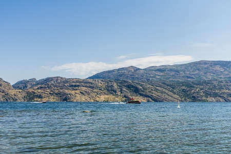 Okanagan lake view at summer time with blue sky british columbia canadaの写真素材